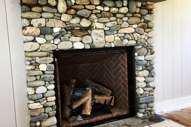 Cozy stone fireplace on the coast of Maine