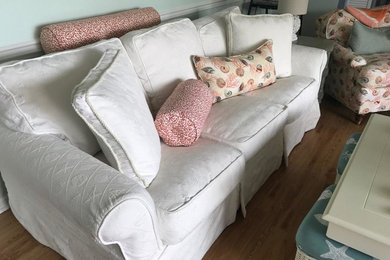 Beach style living room photo in Other
