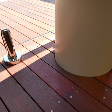 POOL DECK WITH GLASS POOL FENCE