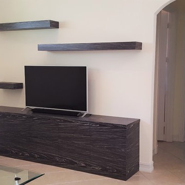 entertainment console in re constituted, dyed, zebra wood veneer
