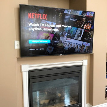 Above fire place TV wall mounting
