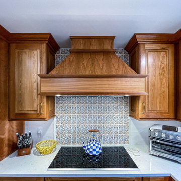 Two-Tone Kitchen Design: Natural Cherry Cabinets and Slate Island