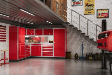 Inspiration for a mid-sized modern attached four-car garage remodel in Boston