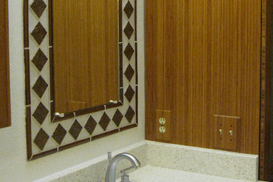 Small bathroom photo in Phoenix with light wood cabinets and brown walls