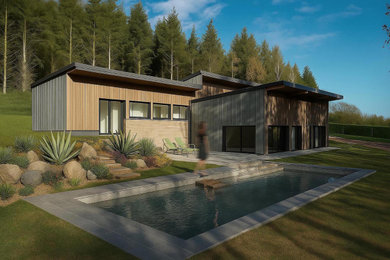 Idée de décoration pour un grand piscine avec aménagement paysager latéral design rectangle avec des pavés en pierre naturelle.