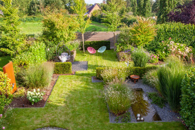 Réalisation d'un jardin avec des solutions pour vis-à-vis.