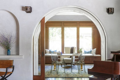 Mid-sized transitional enclosed dining room photo in San Francisco with white walls and no fireplace