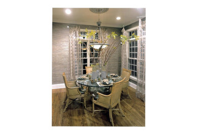 Trendy medium tone wood floor dining room photo in Nashville with multicolored walls