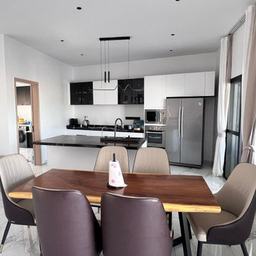 Kitchen Side Angle – Built-In Appliance Wall & Connected Indoor Space Layout