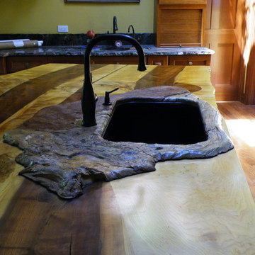 Concrete made to look like a wood burl for kithchen sink opening