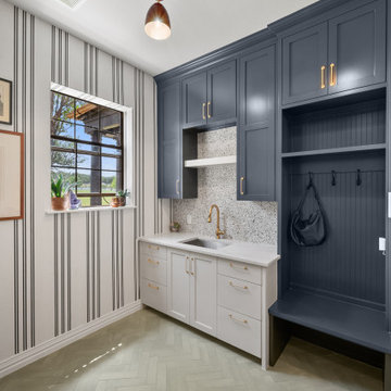 Mudroom and Laundry View with Sage Herringbone Flooring