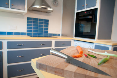 Inspiration for a midcentury kitchen in Other.