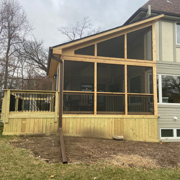 Screen Porch with Cathedral Ceiling, cedar rails, & shed roof in Lake Barrington
