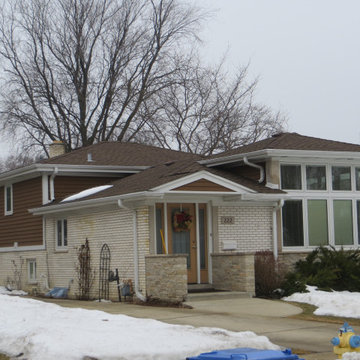 Brick Addition on back of quad level home and new Entrance in Front