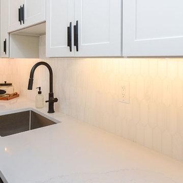 White Kitchen with Picket Backsplash