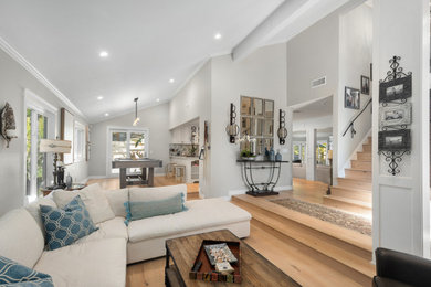 Example of a beach style family room design in San Diego