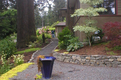 Photo of a mid-sized eclectic landscaping in Portland.