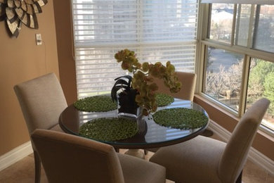 Example of a minimalist dining room design in Toronto