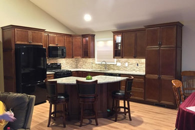 Example of a transitional kitchen design in Boston
