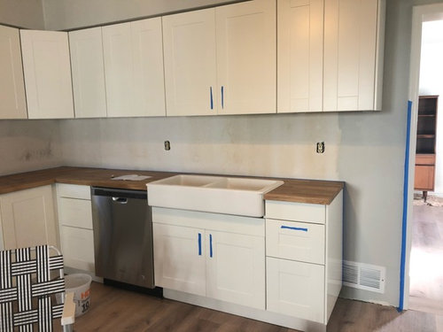 Top Cabinets Extend Past Counter, Lining Up Kitchen Cabinets