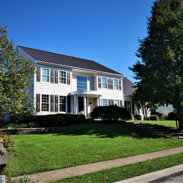 Dark Bronze Standing Seam Metal Roof with Marvin Infinity Windows