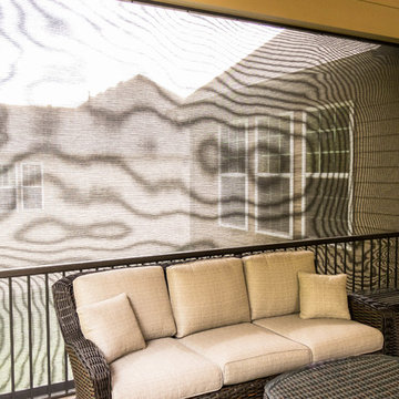 Screen Room Addition with Retractable Screens, Outdoor Kitchen, and Patio