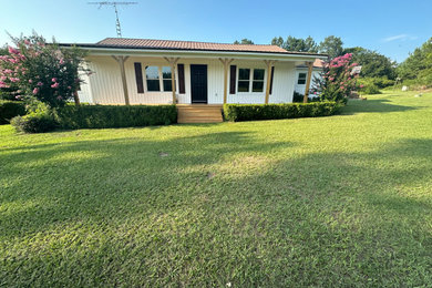 Example of a cottage / country exterior home design