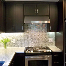 counter/backspalsh with dark cabinets
