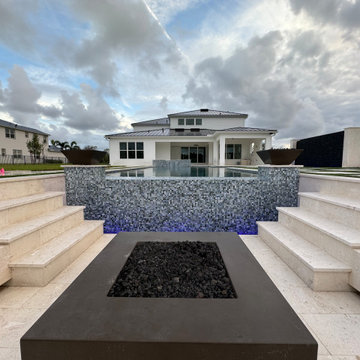 A Poolside Retreat with Sunked Deck and a Fire Pit