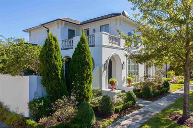 Example of a tuscan home design design in New Orleans