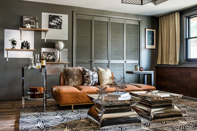 Living room - contemporary medium tone wood floor and brown floor living room idea in Atlanta with gray walls