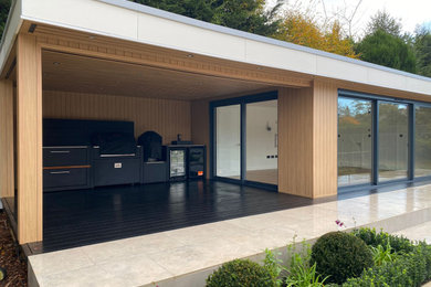 This is an example of a large contemporary garden shed and building in Hertfordshire.