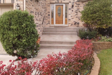 Inspiration for a large single front door remodel in Chicago with a medium wood front door