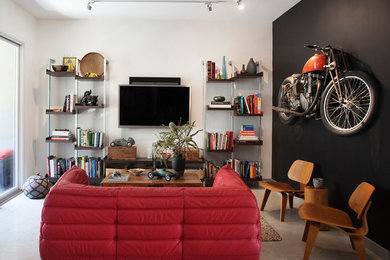 Example of a small eclectic loft-style concrete floor and gray floor living room design in Orange County with a bar, white walls, no fireplace and a wall-mounted tv