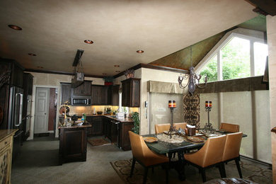 Example of a mid-sized tuscan l-shaped ceramic tile and beige floor eat-in kitchen design in Omaha with an undermount sink, shaker cabinets, dark wood cabinets, granite countertops, beige backsplash, ceramic backsplash, stainless steel appliances and an island