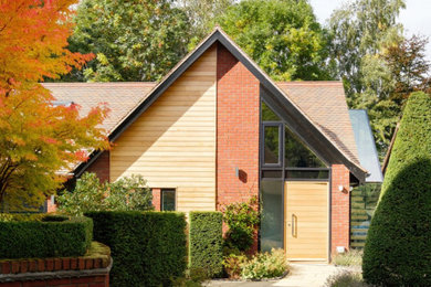 Design ideas for a modern house exterior in Cheshire.