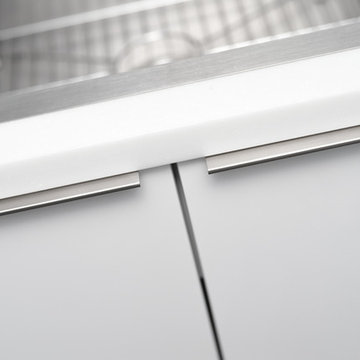 Acrylic Cabinetry with Stainless Steel Roll-Out Shelves from Dura Supreme