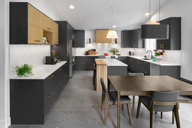 Inspiration for a mid-sized contemporary u-shaped ceramic tile, gray floor and vaulted ceiling eat-in kitchen remodel in Edmonton with an undermount sink, flat-panel cabinets, gray cabinets, quartz countertops, white backsplash, quartz backsplash, stainless steel appliances, an island and white countertops