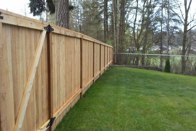 Home design - mid-sized traditional home design idea in Seattle
