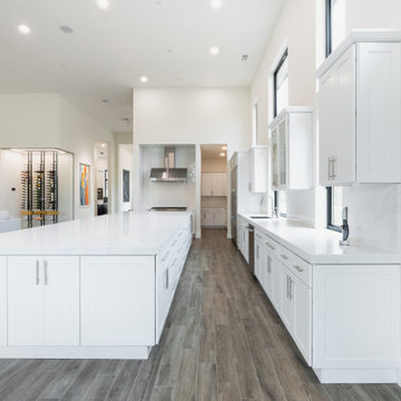 Modern White Shaker Kitchen with Oversized Island & Custom Storage Solutions