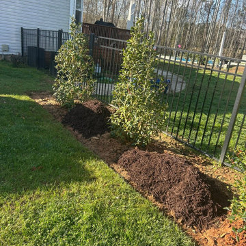Custom Turf Landscape Area with Stone Border