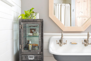 Inspiration for a country bathroom in Seattle with grey walls, mosaic tile floors, a wall-mount sink, white floor, a double vanity, planked wall panelling and decorative wall panelling.
