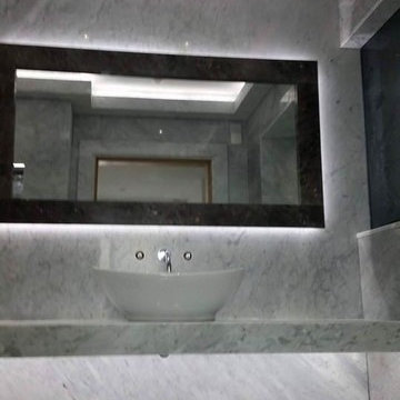 Carrara marble bathroom by ADL Tile and Stone