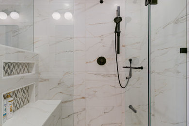 Inspiration for a transitional master white tile and porcelain tile porcelain tile and double-sink bathroom remodel in Toronto with furniture-like cabinets, light wood cabinets, a two-piece toilet, an undermount sink, quartzite countertops, a hinged shower door, white countertops, a niche and a floating vanity