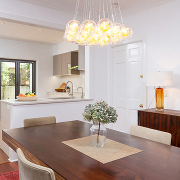 Old City, Philadelphia: Sleek Modern Kitchen with Triptych Cafe Door