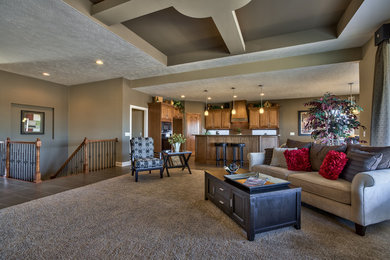 Example of a large minimalist open concept carpeted living room design in Omaha with a standard fireplace, a stone fireplace and a wall-mounted tv
