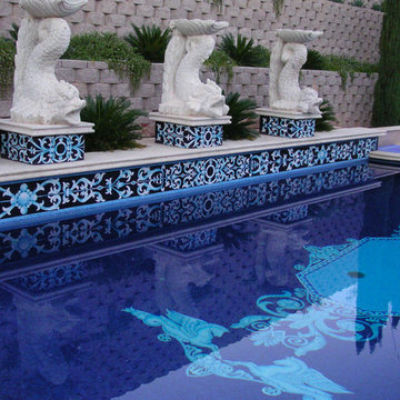 Baroque mosaic band and sculpted dolphin fountains — Tucson