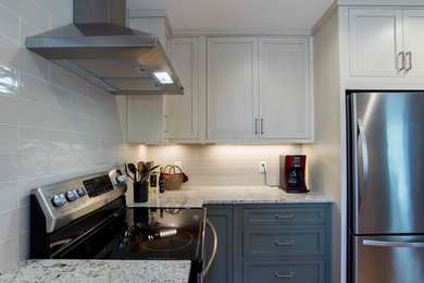 Example of a transitional kitchen design in Miami