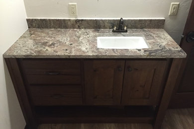 Bathroom photo in Other with granite countertops