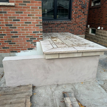Concrete Back Deck Transformation To Masonry Natural Stone Porch and Steps